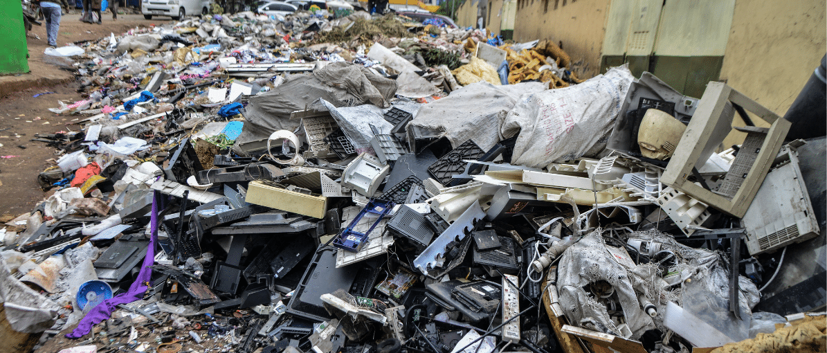 plastic trash piled by a roadside