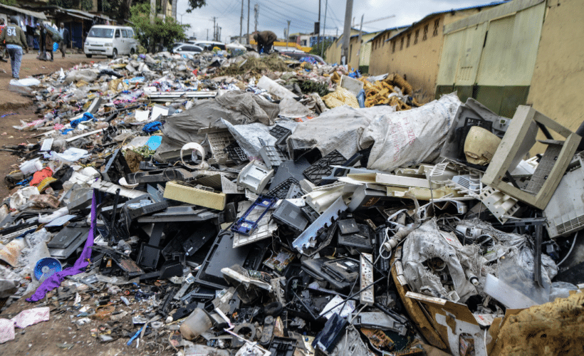 plastic trash piled by a roadside