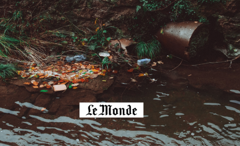 plastic pollution in murky water, LeMonde logo in foreground