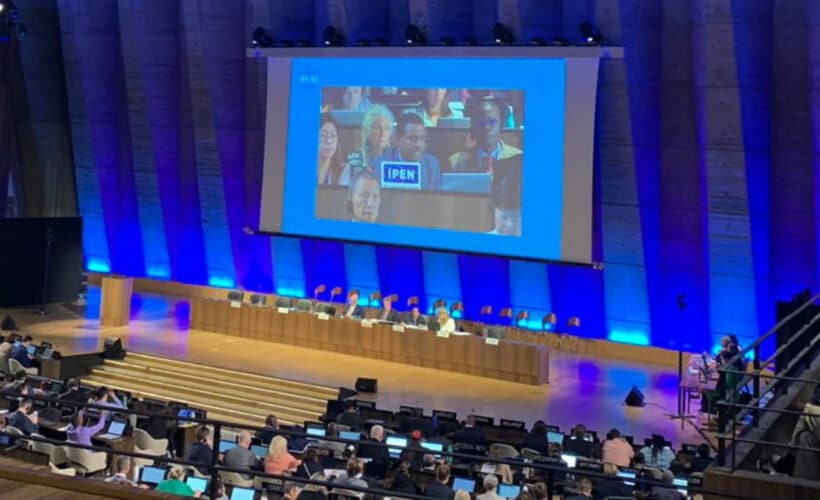 the plenary hall with IPEN speaker on a large video screen