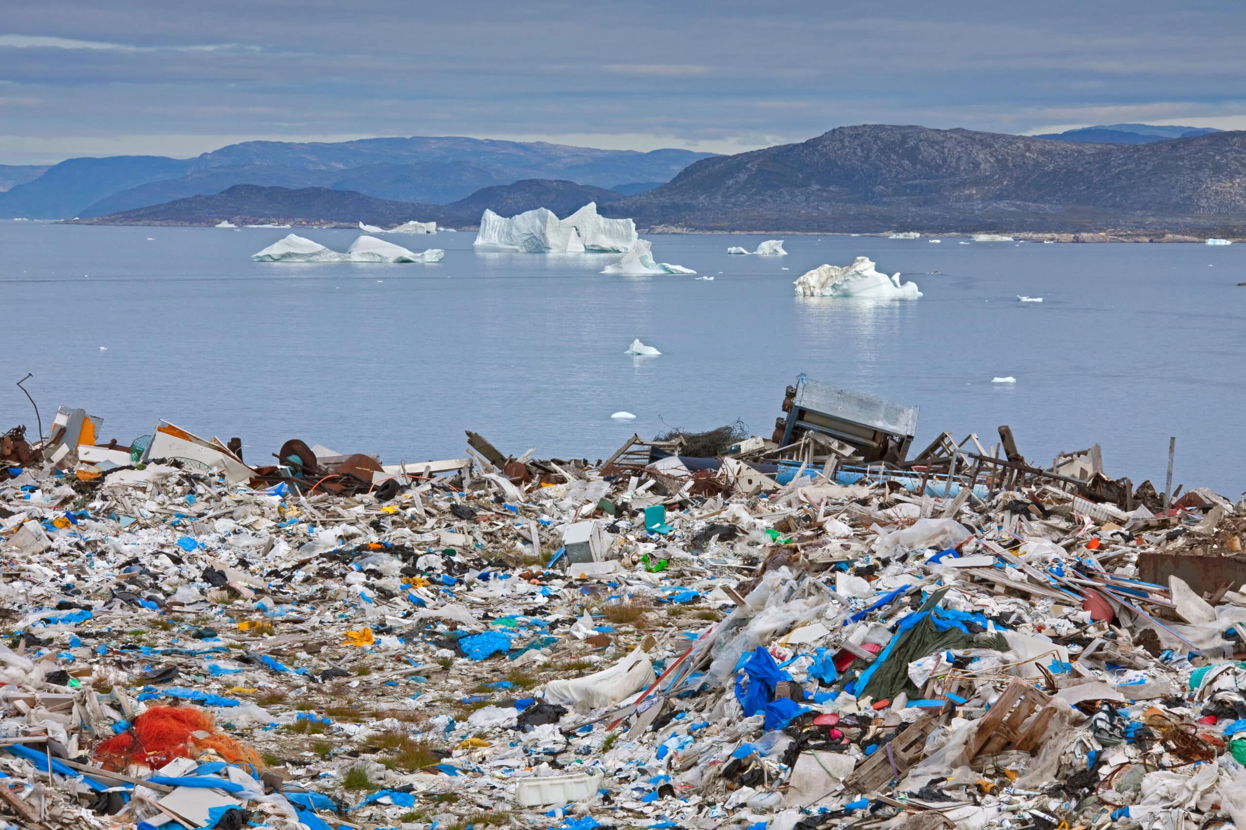 Trash and plastic waste with icebergs